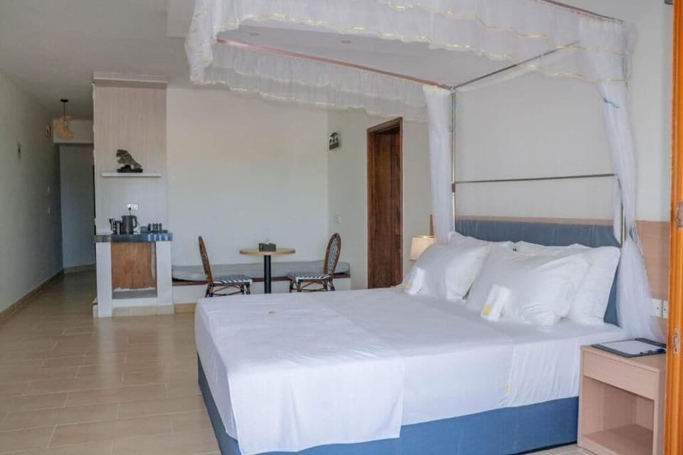Superior Double Room, Balcony, Garden View | In-room safe, desk, laptop workspace, blackout drapes