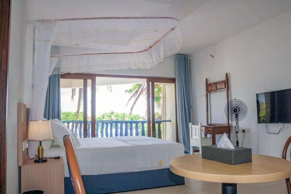 Superior Double Room, Balcony, Garden View | In-room safe, desk, laptop workspace, blackout drapes