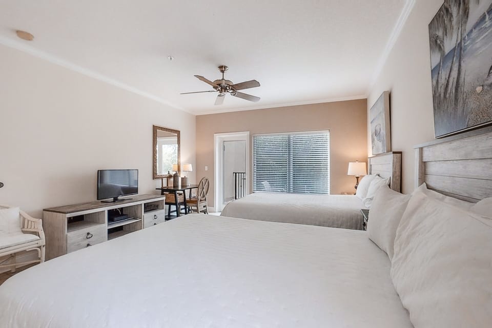 Villa, 2 Queen Beds, Balcony, Pool View (2533 Tennis Villas Efficiency) | 1 bedroom, individually decorated, individually furnished, bed sheets
