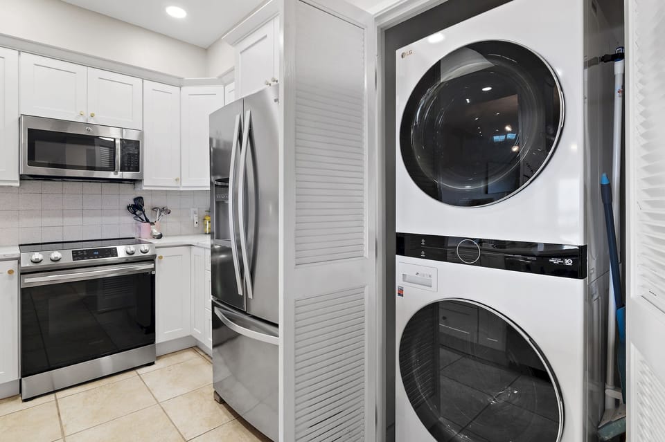 French Door Refrigerator provides plenty of food storage space and Full Size Washer/Dryer is perfect for family size loads