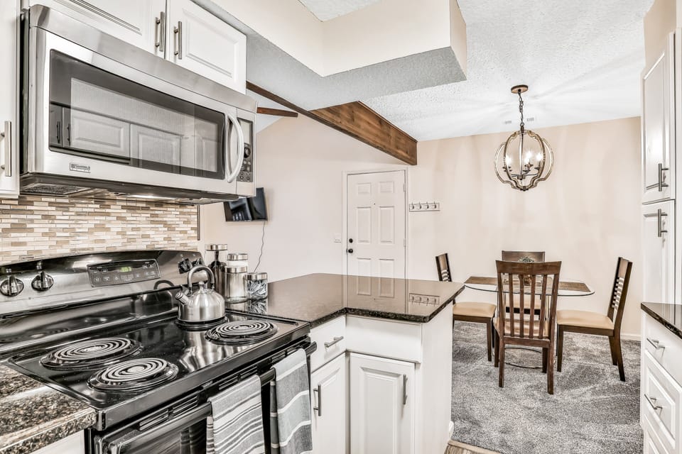 Condo, Multiple Beds, Balcony, Pool View (Forest Ridge 2725) | Private kitchen