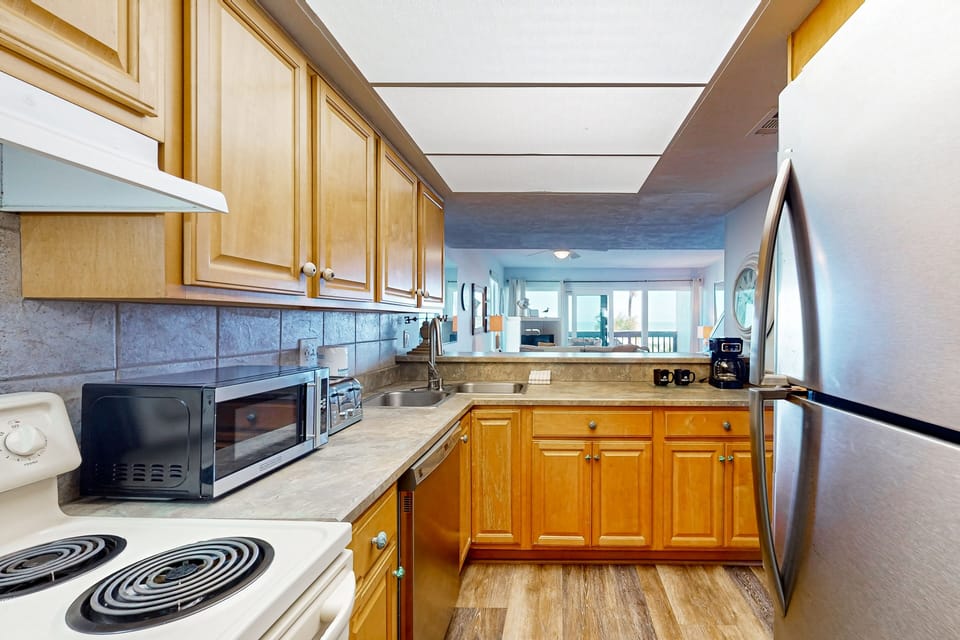 Condo, Multiple Beds, Balcony, Ocean View (Ocean Waves Cove) | Private kitchen