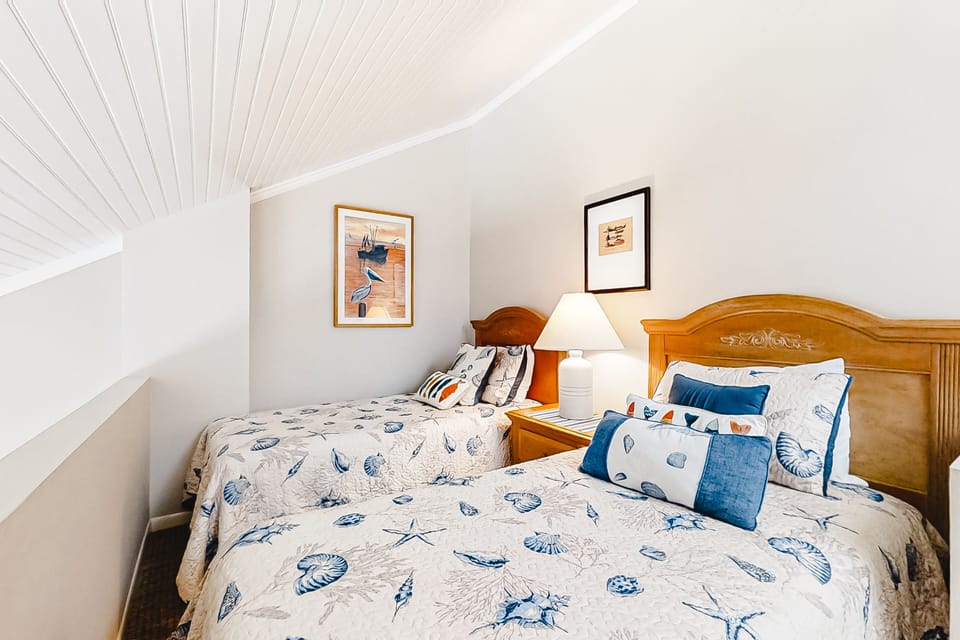 Condo, Multiple Beds, Patio, Beach View (1114 Beach Walker) | 2 bedrooms, individually decorated, individually furnished, bed sheets
