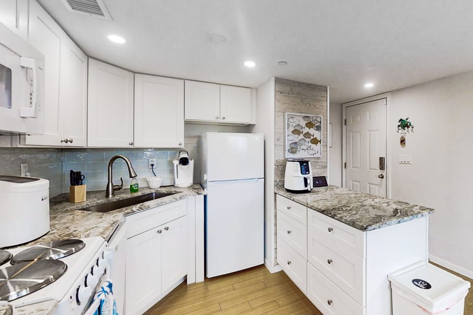Condo, Multiple Beds, Patio, Beach View (First Street South Serenity) | Private kitchen