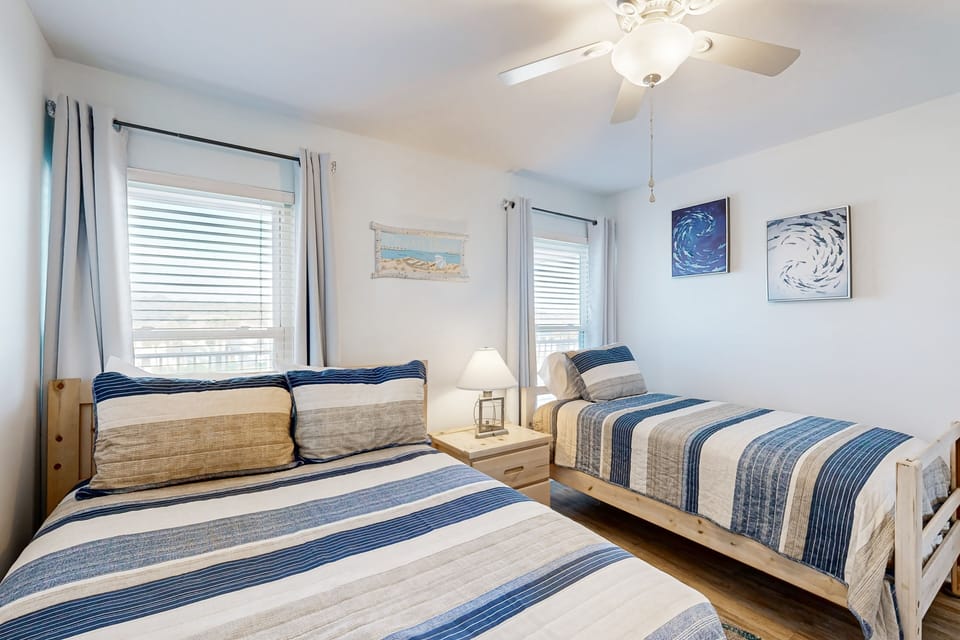 Condo, Multiple Beds, Patio, Ocean View (302 Atlantis on Amelia) | 2 bedrooms, individually decorated, individually furnished