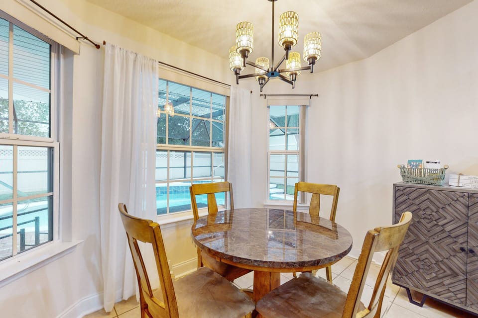 House, Multiple Beds, Pool Access, Pool View (Porpoiseful Living) | 4 bedrooms, individually decorated, individually furnished, bed sheets