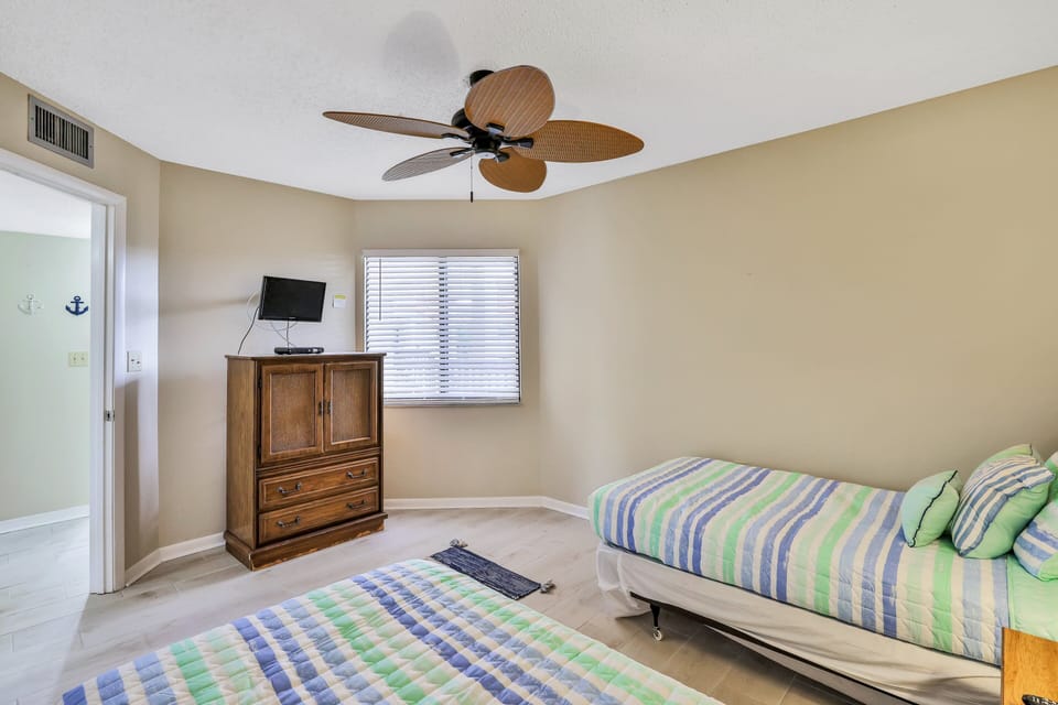 Condo, Multiple Beds, Pool Access, Pool View (Ocean Village Club Condo Unit #E-35) | 2 bedrooms, individually decorated, individually furnished, bed sheets