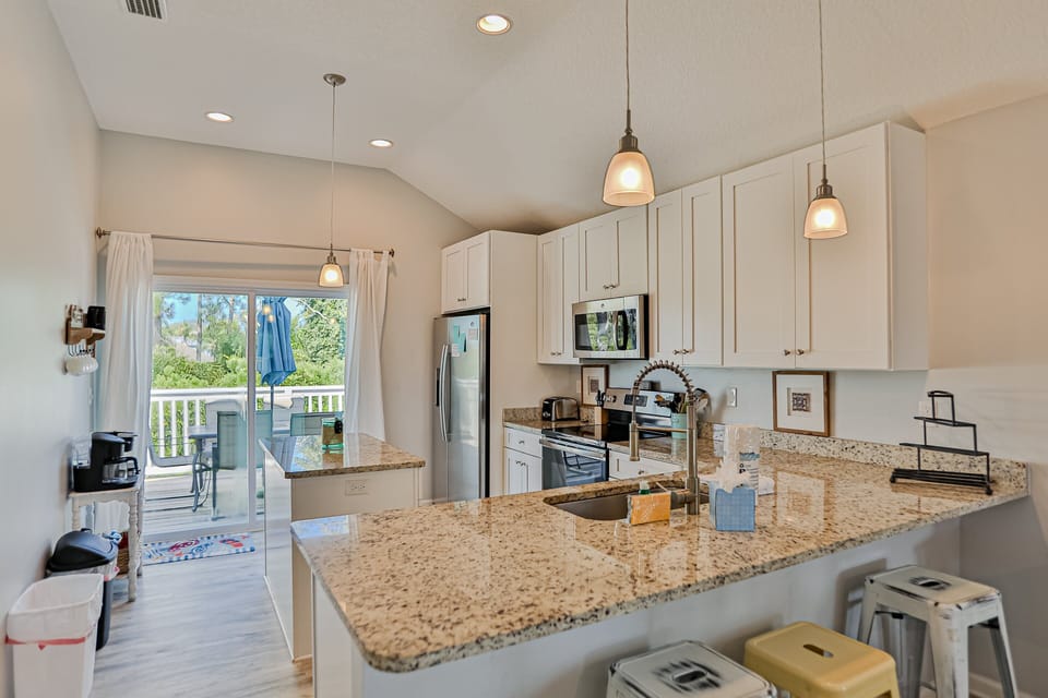 House, Multiple Beds, Pool Access, Pool View (Dancing Dolphins and Tranquil Turtles) | Private kitchen