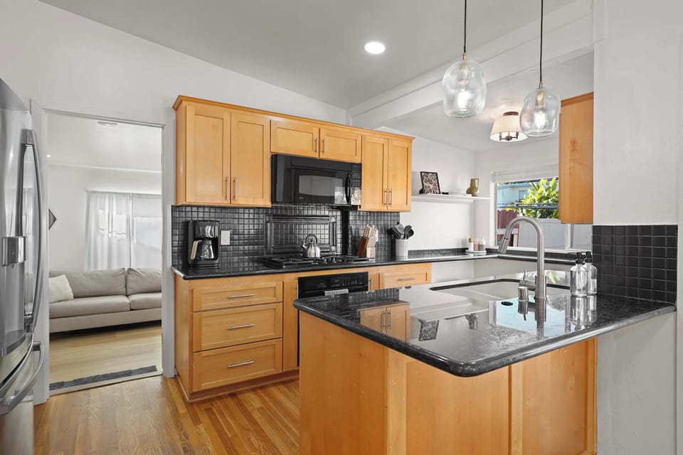 Kitchen with stainless appliances and ample storage