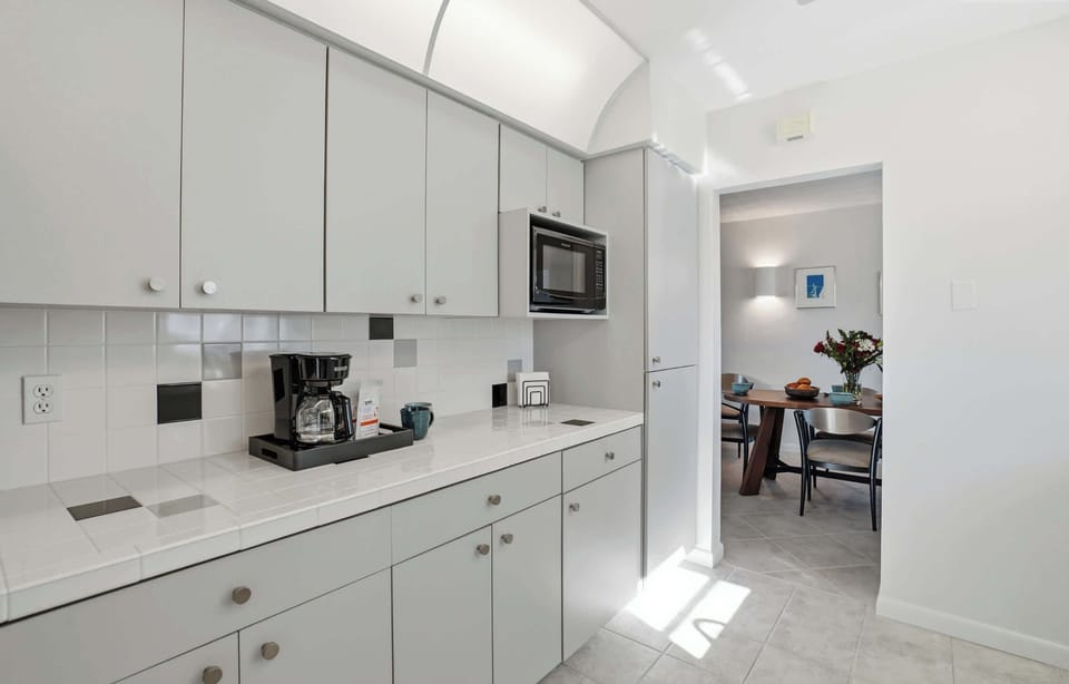 Open kitchen and dining area perfect for casual island living