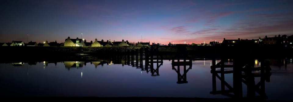 Looking back to Seatown over the old bridge at dusk