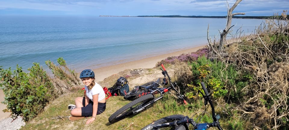 a rest from mountainbiking at Roseisle Beach
