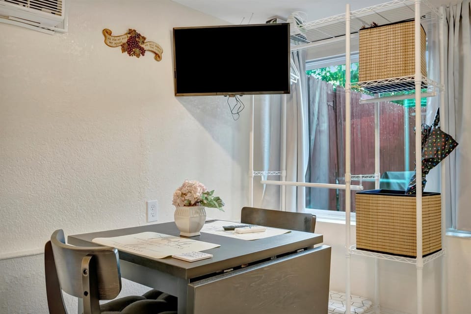 Dining table with TV for meals and entertainment