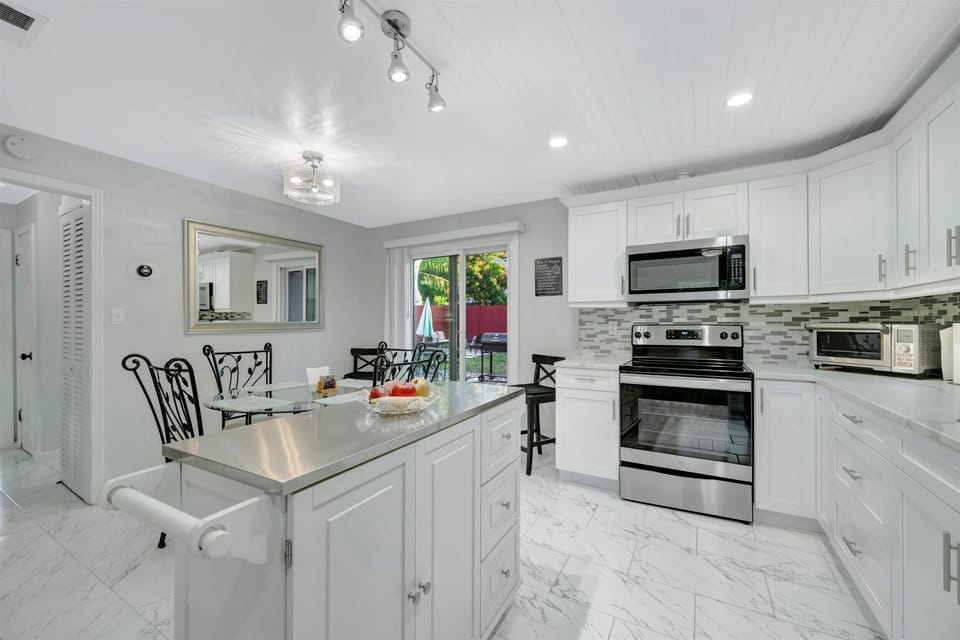 Bright kitchen with island and open layout
