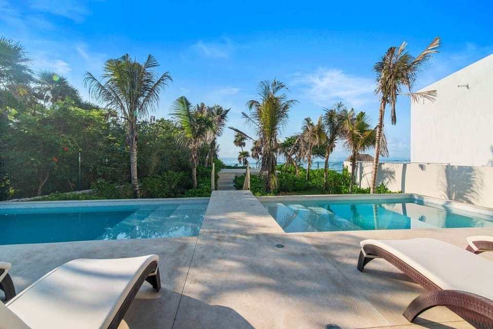 Embark on a journey to our exclusive beach club for a taste of paradise! Relax under umbrellas, unwind by the pools amidst lush scenery, and revel in direct beach access for the ultimate escape.