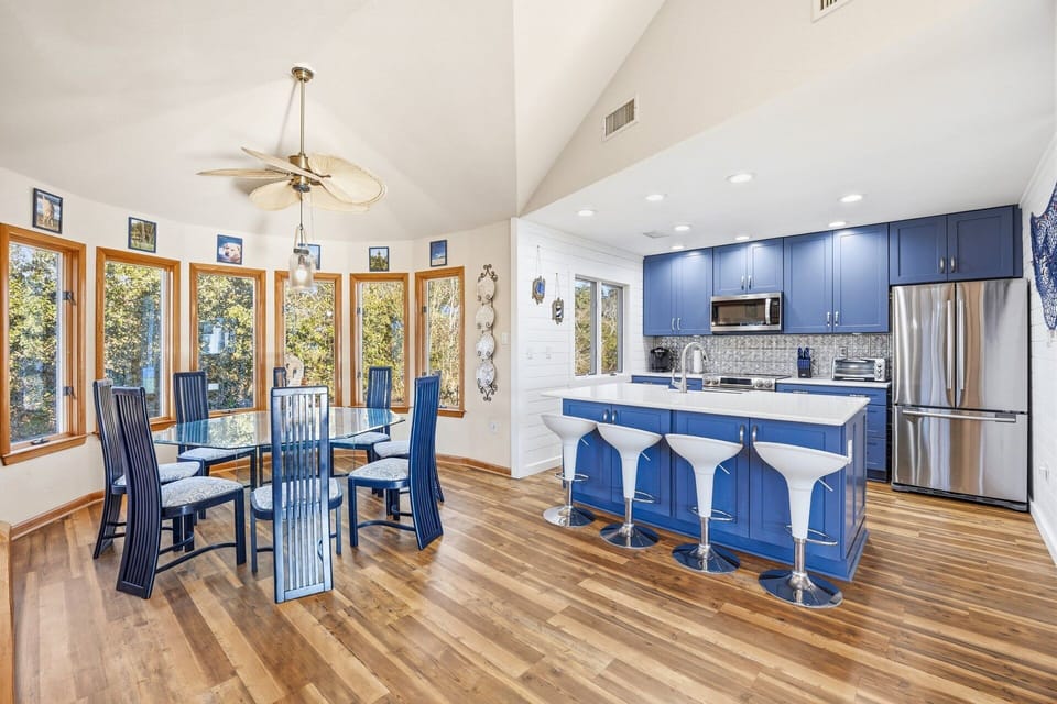 The dining area is perfectly positioned for shared meals and family conversations.