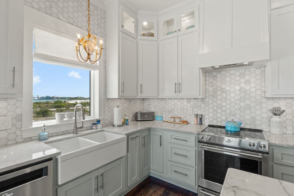 Wash dishes while you watch the boats drift across Santa Rosa Sound