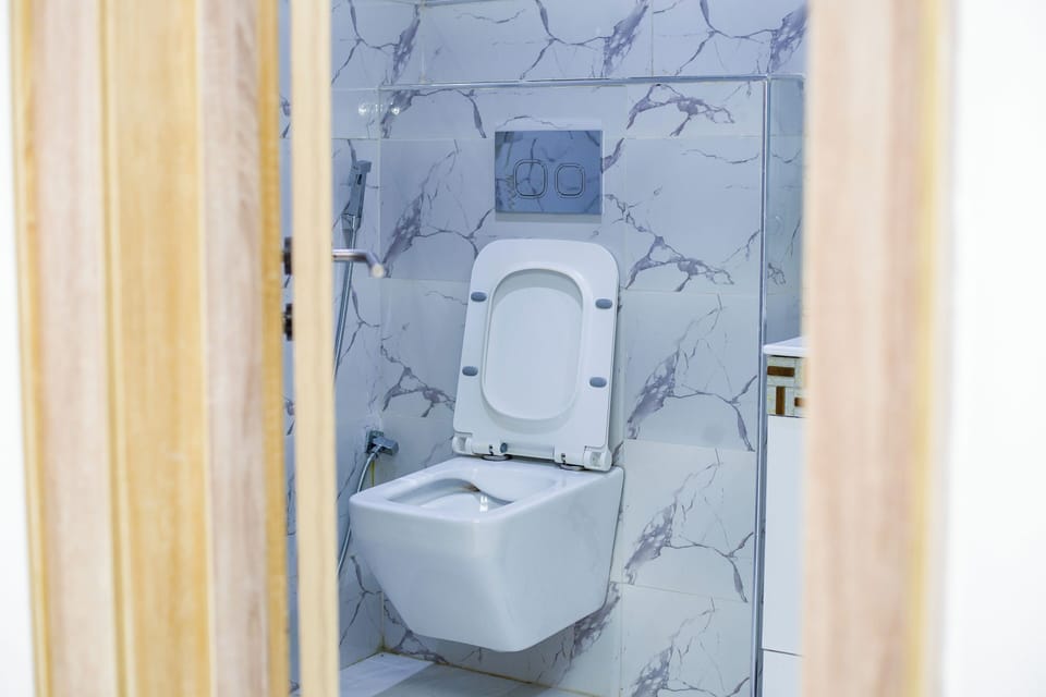 Luxury Apartment, Patio, Courtyard View | Bathroom | Shower, free toiletries, slippers, towels