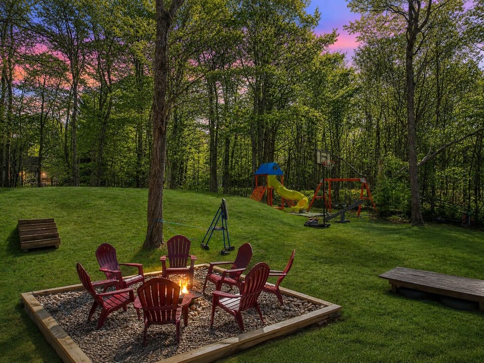 Evenings feel magical by the fire pit surrounded by trees and mountain air.