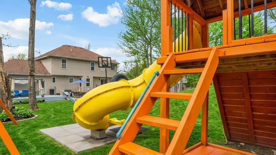 A backyard for nonstop kid fun—climbing, sliding, laughing, making memories.
