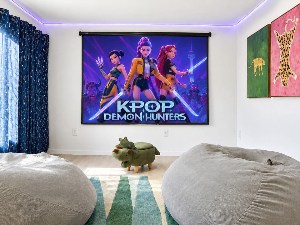 Movie nights upgraded—curl up in bean bags for a colorful cinematic experience.