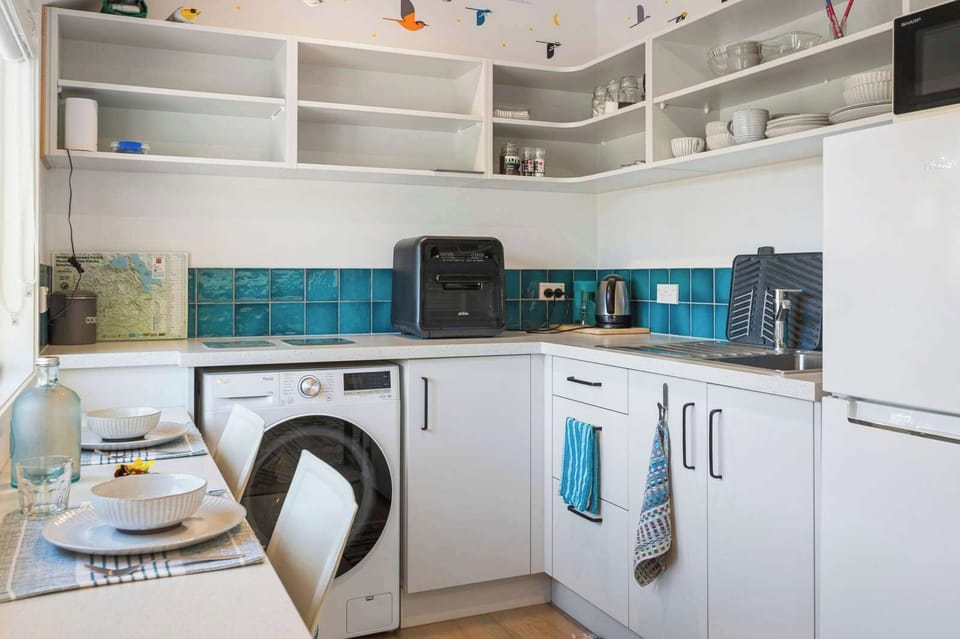 You'll find a super functional little kitchenette area with lots of extras to make your stay comfortable.