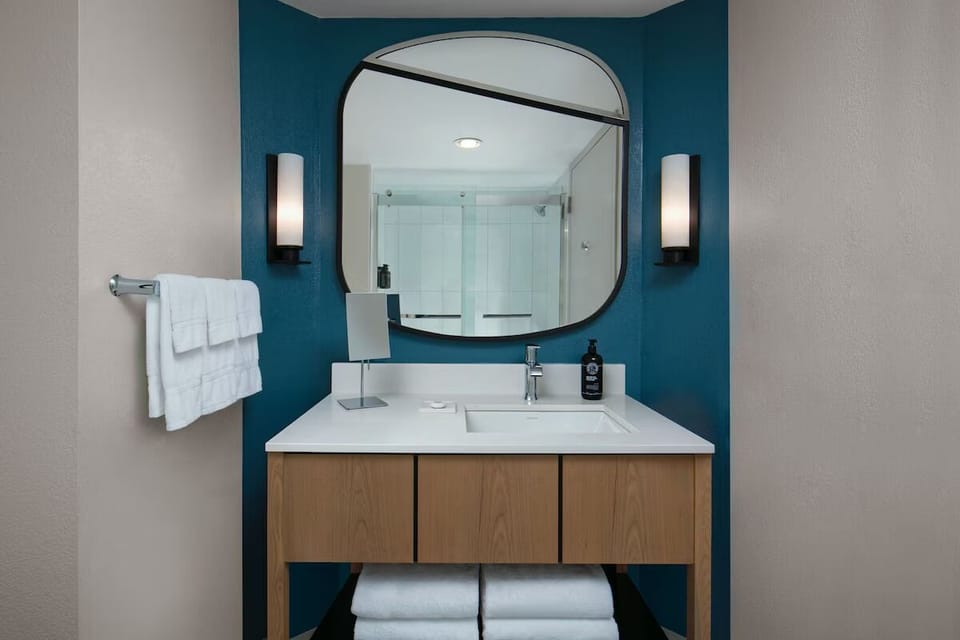 Get ready with a stylish vanity and flattering mirror lighting.