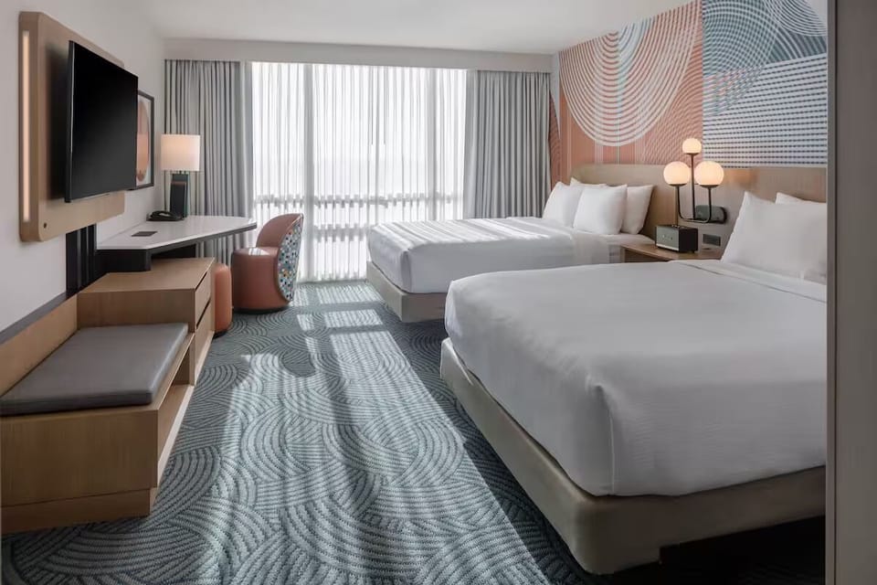 Spread out in a sunlit two-bed room made for sharing.