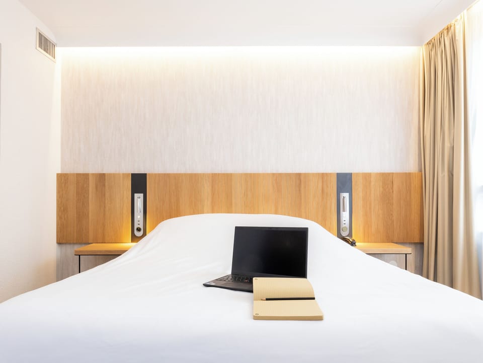 Premium bedding, memory foam beds, minibar, in-room safe