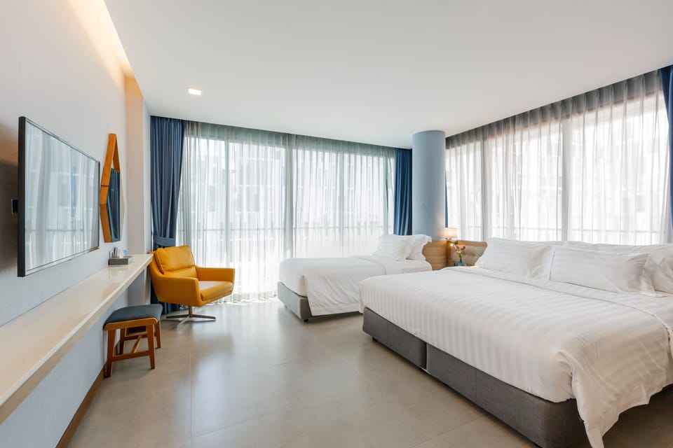 Deluxe Triple Room | In-room safe, desk, blackout drapes, soundproofing