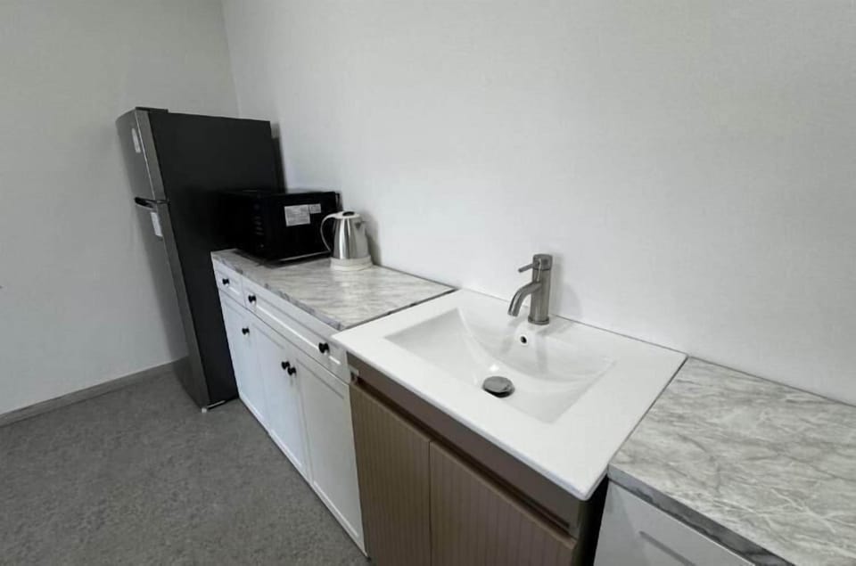 Junior Suite, Balcony, River View | Private kitchen | Fridge, microwave