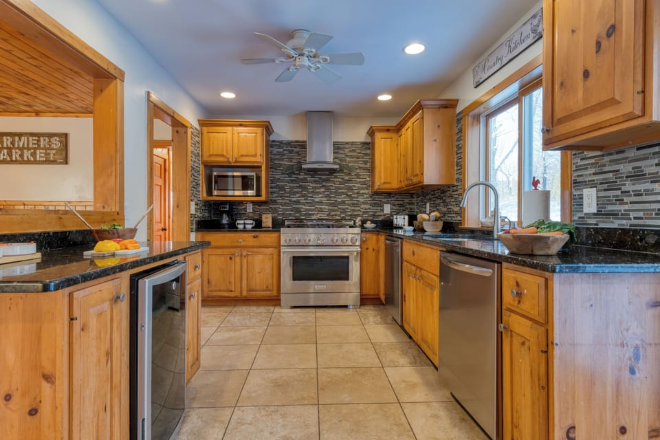 Fully equipped kitchen with reliable appliances and ample counter space for meal prepping.