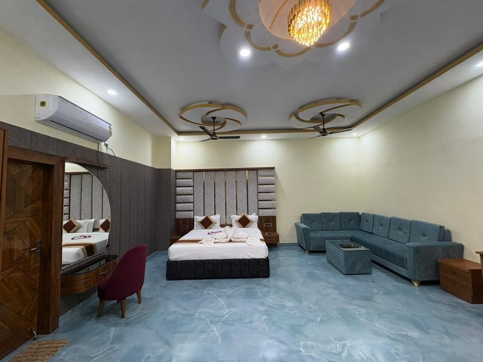 Luxury Suite | Living area | 52-inch LED TV with cable channels, Netflix, streaming services