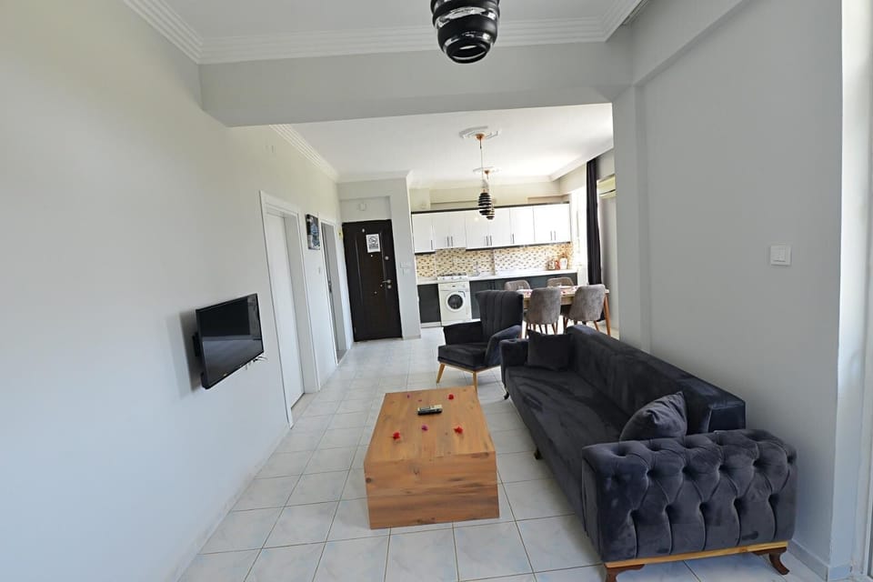 Standard Apartment, Balcony | Living area | 20-inch LED TV with satellite channels