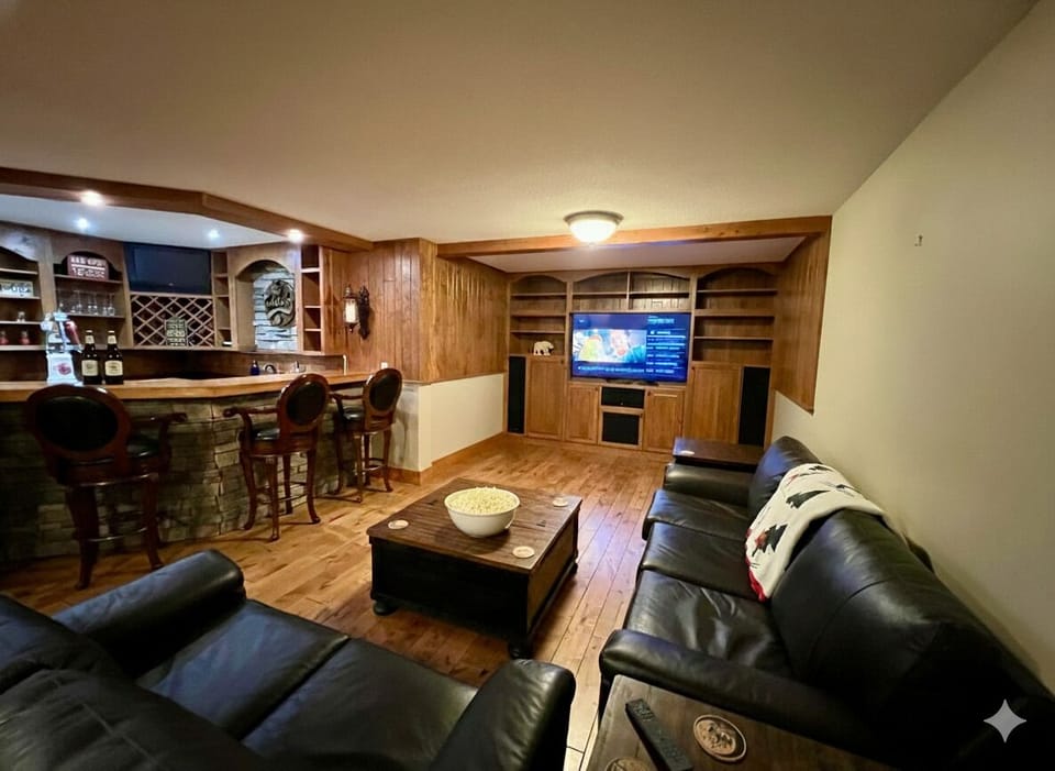 Lower-level Rec Room. Extra dining (Games table), Wet Bar, TV, Family Room.