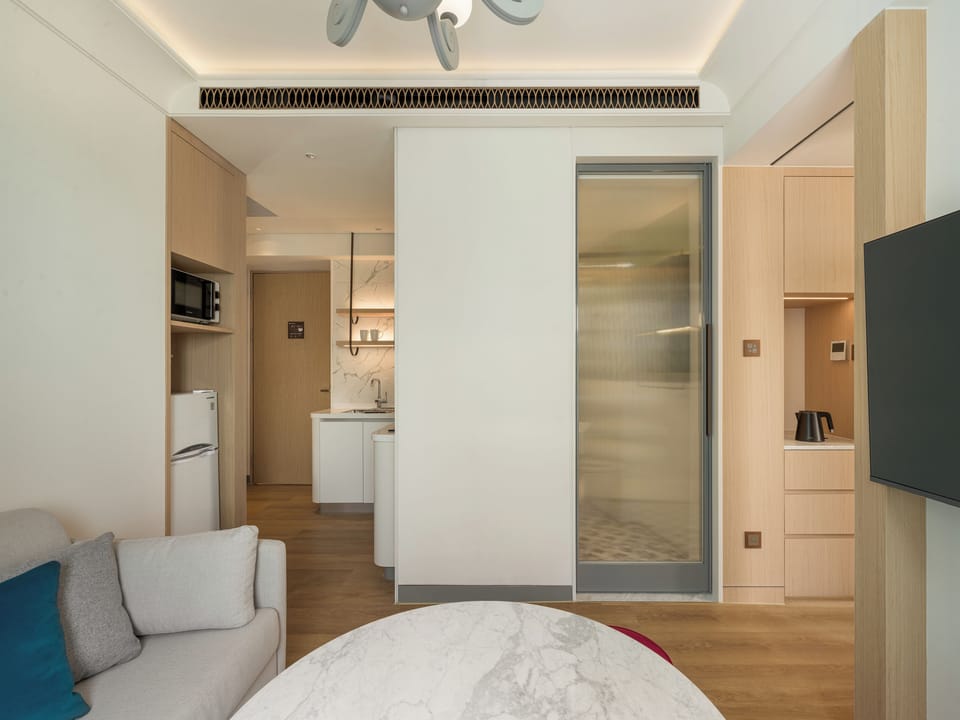 Superior Studio Suite, 1 King Bed, Non Smoking, Balcony | Bathroom | Shower, rainfall showerhead, hair dryer, towels