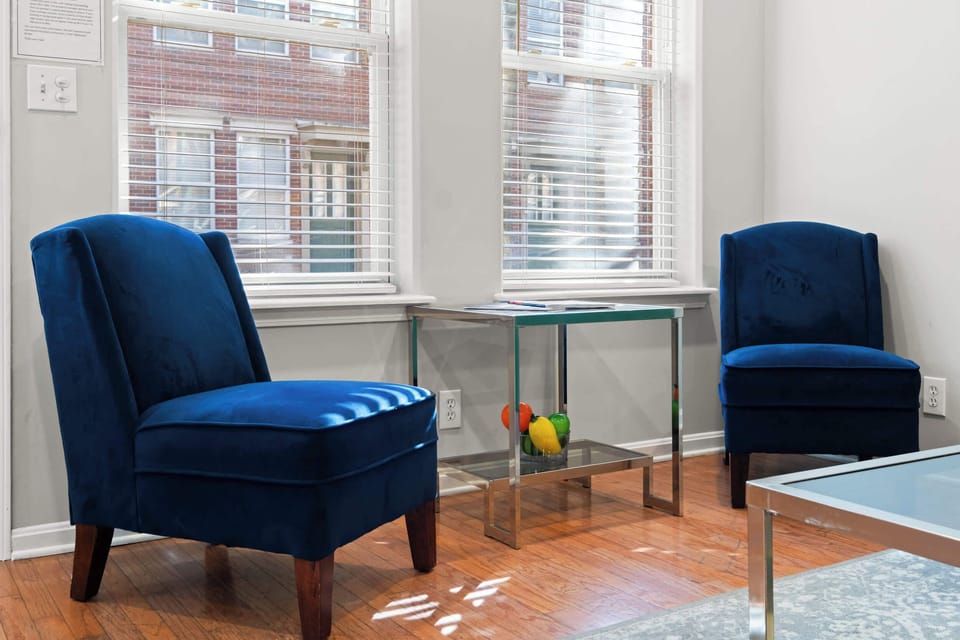 Living Room 1: Light-filled and stylish, this living room is made for relaxing in effortless comfort