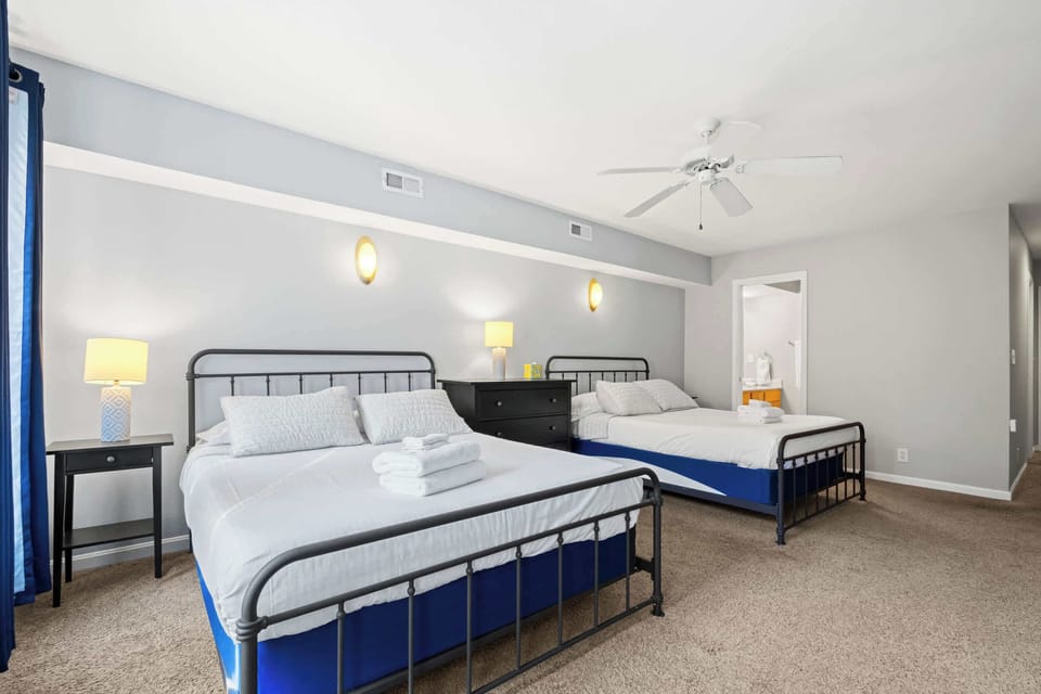 Bedroom 1: A spacious bedroom with two comfortable beds, ideal for families or friends traveling together