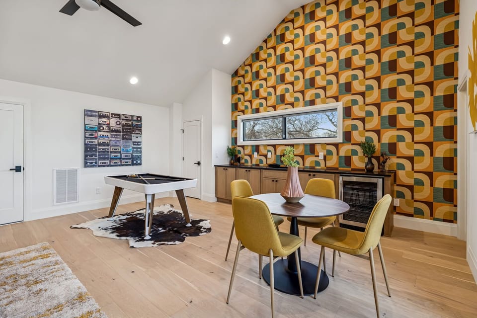 Game loft: Bring the whole crew together in this modern game loft—complete with a pool table, lounge seating, and cozy bunk beds made for late-night fun.