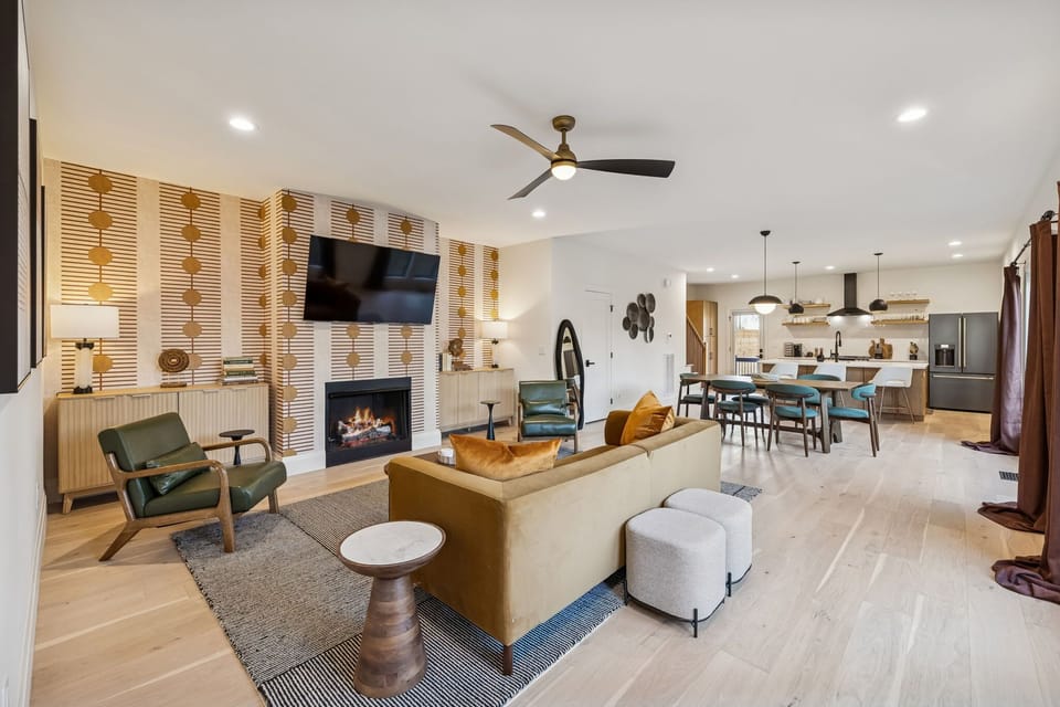 Living Room: Designed for groups who love comfort and convenience—this modern living room features a large smart TV, contemporary décor, and plenty of space to unwind together.