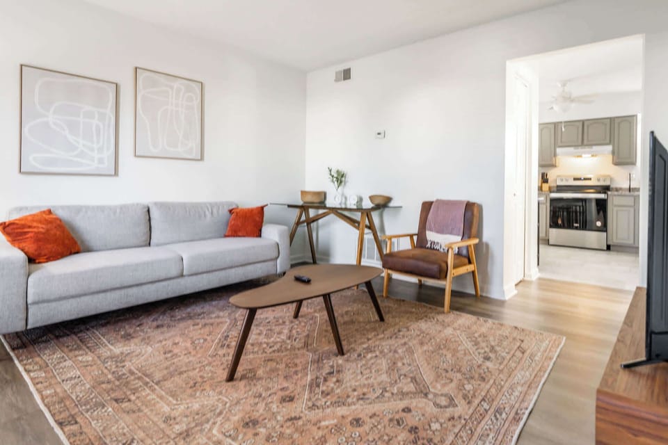 Living Room: Bright and open living area, perfect for entertaining or relaxing after a long day.