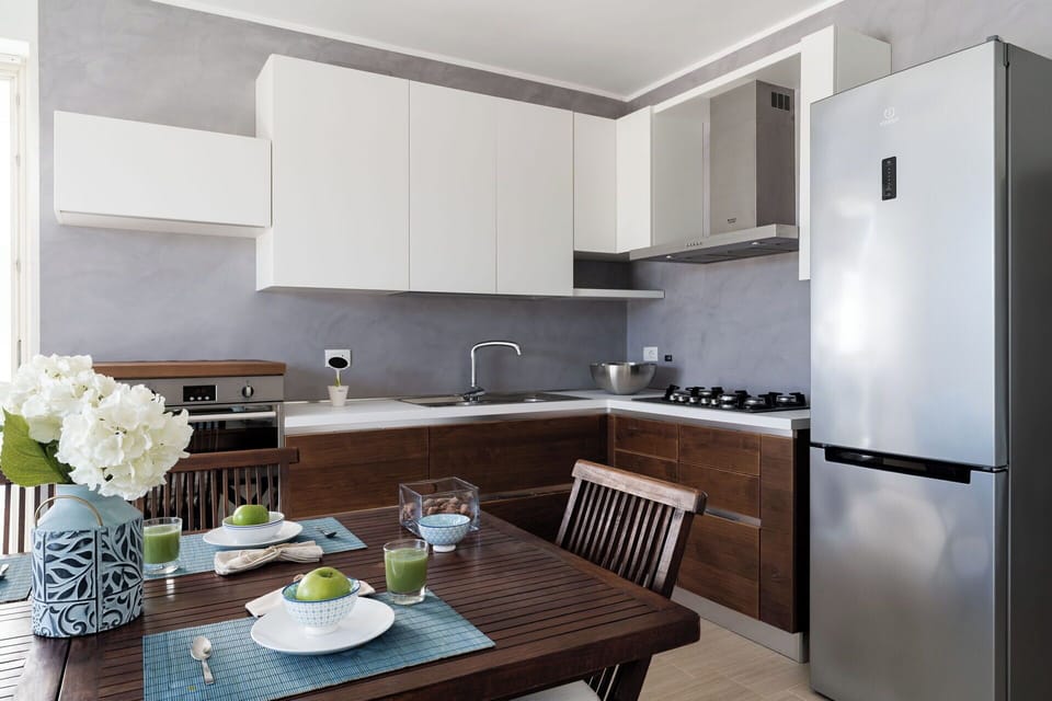Furniture, Kitchen Appliance, Kitchen, Countertop, Cabinetry, Interior Design, Major Appliance, Home Appliance, Flooring, Kitchen Stove