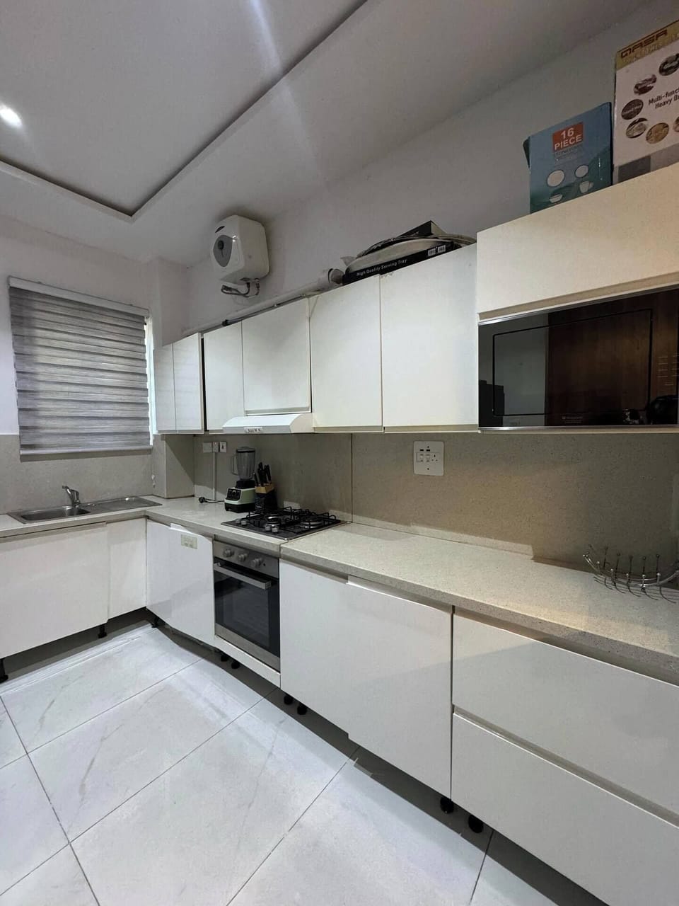 Family Apartment, Balcony, City View | Private kitchen | Fridge, microwave, oven, stovetop