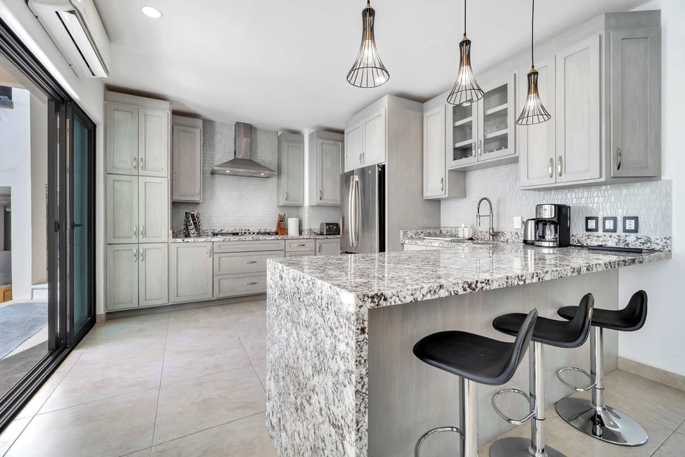 Grand Villa, Sea View | Private kitchen | Coffee/tea maker, electric kettle, paper towels, dining tables