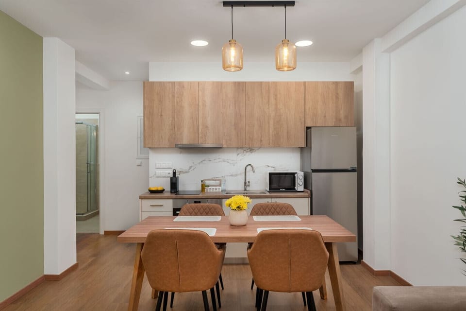 Dining area + fully equipped kitchen for easy meals at home