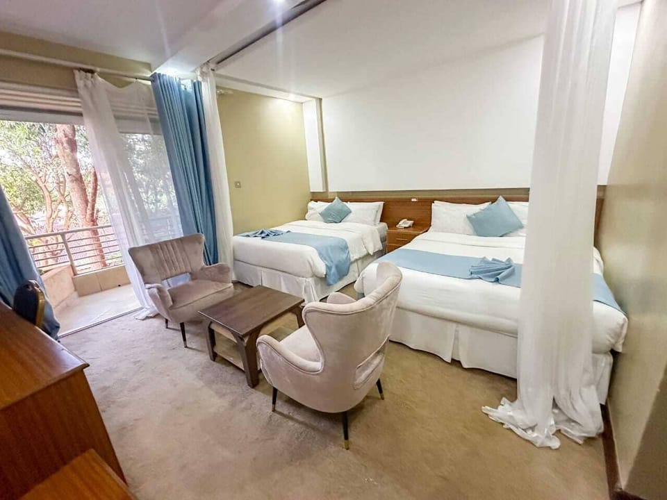 Deluxe Twin Room, Balcony, City View | Free WiFi, bed sheets