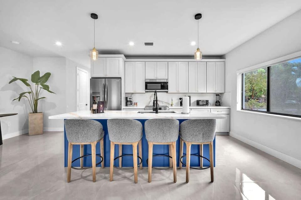 Both units feature spacious modern kitchen with a large island, plenty of storage, and all the essentials to cook your favorite meals during your stay.
