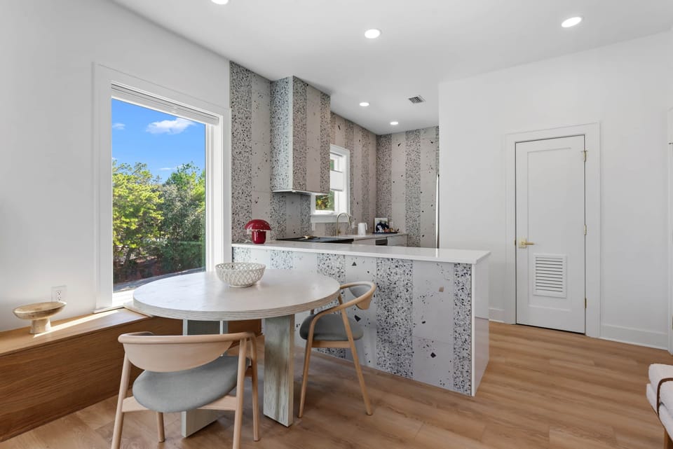 Guest house kitchen and dining area designed for relaxed meals and easy gatherings
