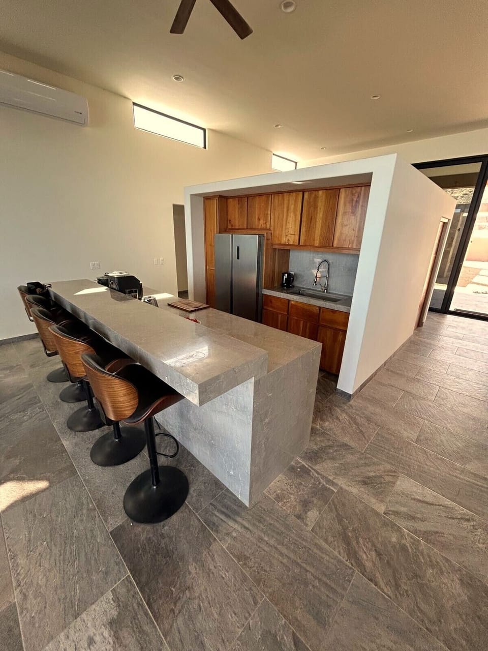 Food prep area with full size fridge