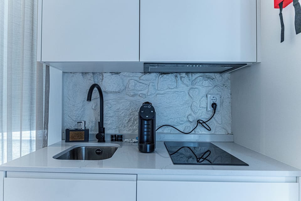 Double Room, Kitchenette, City View | Private kitchen | Shared fridge, microwave